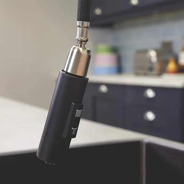 Matt black pull-out kitchen tap spray nozzle with modern design in luxury kitchen setting