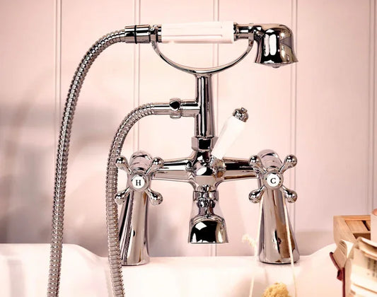 Victorian chrome bath shower mixer tap with white handle, installed on a white bathtub, Tiles and Taps